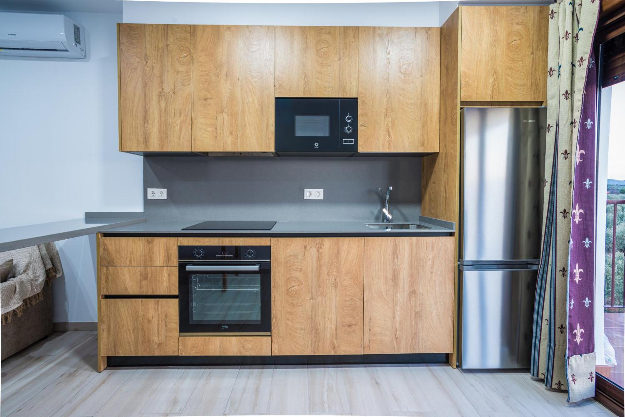 Apartamentos Turisticos Rurales Camino Rio Peralta 波索爱尔康 外观 照片